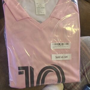 Pink V-Neck Athletic Top with Black Graphic